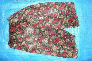 Image: 3/4 length floral pattern pants