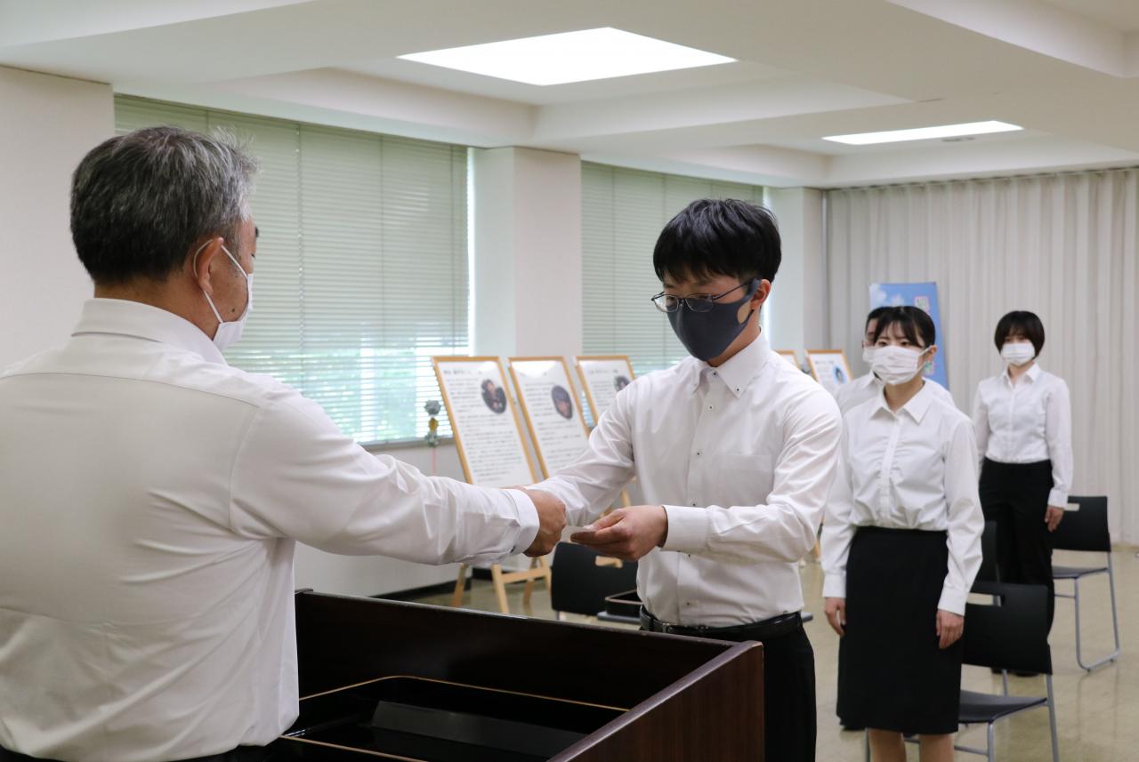 登録式登録書交付写真
